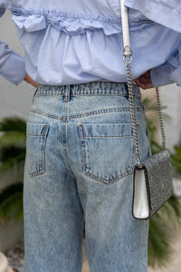 THE JONES Flared Mid-Rise Light Wash